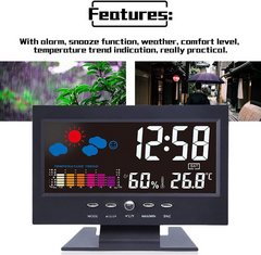 Digital clock with weather and temperature display on a white background