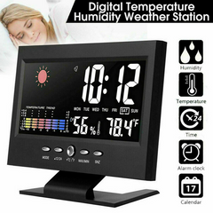 Digital temperature humidity weather station with clock and calendar functions on a white background.