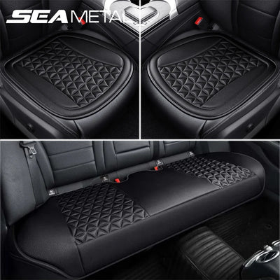 Black car seat cover with diamond pattern on a vehicle seat.