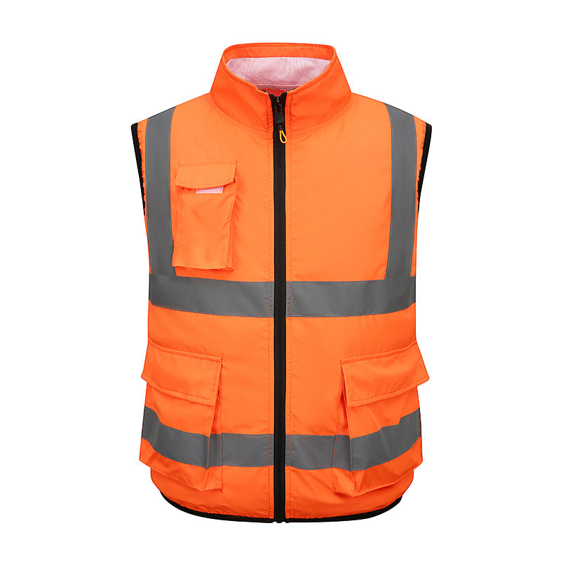 Orange safety vest with reflective stripes on a white background