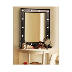 Makeup mirror with light bulbs on a beige wall