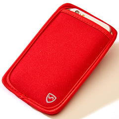 Red phone case with a brand logo on a beige surface