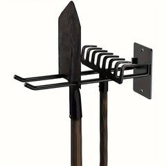 Black metal broom and brush holder on a white background