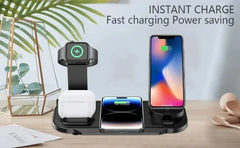 A black 3-in-1 wireless charging dock shown on a wooden table with an Apple Watch, AirPods case, and smartphone plugged in. The image includes promotional text reading 'INSTANT CHARGE Fast charging Power saving' and is styled with decorative leaves and paper props.