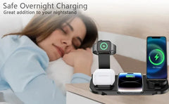 A wireless charging dock with multiple devices shown in a bedroom scene next to a sleeping woman. The charging pad includes a phone, earbud case, and smartwatch, with text reading 'Safe Overnight Charging' and 'Great addition to your nightstand'.