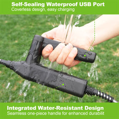 A black self-sealing waterproof USB port connector being held by a hand outdoors, with water spraying around it. Green text banners at the top and bottom describe the waterproof and water-resistant features.