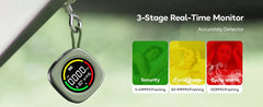 A digital real-time monitor keychain hanging from a metal ring, shown against a blurred green background with promotional text reading '3-Stage Real-Time Monitor' and three colored stage icons labeled Security, Cycle Alarm, and Cycle alarm.