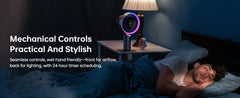 A man lies in bed in a dimly lit bedroom while a smart night light with a circular face and purple ring stands on a bedside table. Text on the left reads 'Mechanical Controls Practical And Stylish' with additional feature copy below.
