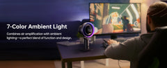 Person using a computer with 7-color ambient light device on desk