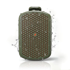 An olive green waterproof speaker with a geometric honeycomb grille, shown with water droplets and splashes on a white background.