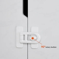 White plastic door safety latch on a light gray door, with an orange highlighted rotary button and text reading '90° rotary button'.