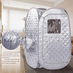 Portable steam sauna tent with quilted design in a room setting