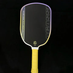 A pickleball paddle with a black face, yellow and white accents, and a yellow grip handle, shown against a solid black background.