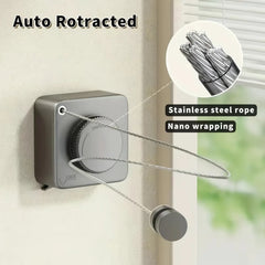 Auto retractable mechanism with stainless steel rope and nano wrapping on a wall.