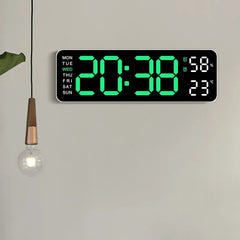 A rectangular digital wall clock with a black face and bright green LED numbers, mounted on a light gray wall. The clock shows the time 20:38, days of the week from MON to SUN, and temperature readings in Fahrenheit and Celsius.
