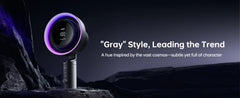 A modern cylindrical device with a circular front display and a glowing purple ring around the top, shown on a dark rocky landscape background with promotional text reading 'Gray' Style, Leading the Trend.'.