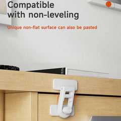 White cabinet lock on a wooden cabinet with text about compatibility with non-leveling surfaces.