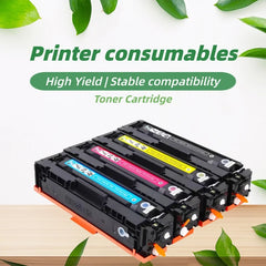 Four toner printer cartridges in black with cyan, magenta, and yellow ink labels, displayed on a wooden surface with green leaves and promotional text reading 'Printer consumables' and 'High Yield | Stable compatibility'.