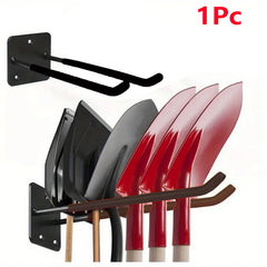 Wall-mounted tool holder with four garden shovels on a white background