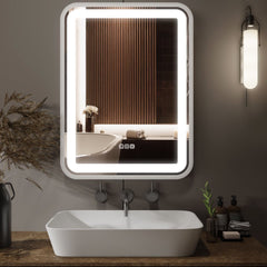 Bathroom with a modern sink and illuminated mirror.