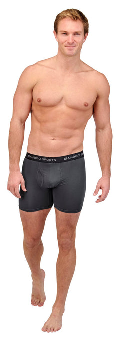 Man wearing gray boxer briefs on a white background