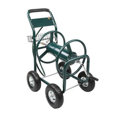 Green garden hose reel cart with wheels on a white background