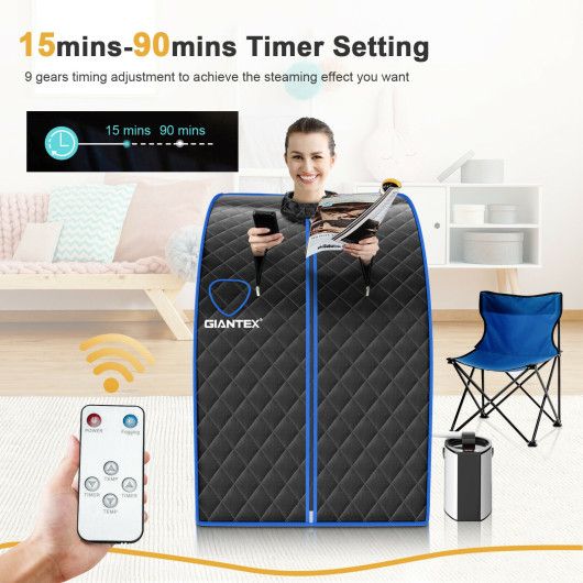 Giantex infrared sauna tent with remote control and timer display in a living room setting.