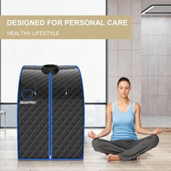 Giantex infrared sauna tent with a woman meditating in a modern room.