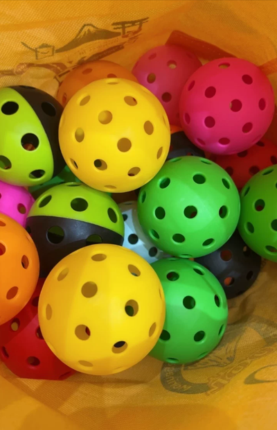 12-Pack Pickleball Balls, 26- and 40-Hole Options